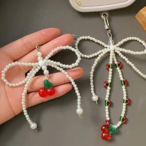พวงกุญแจลูกปัดรูปโบว์เชอร์รี่พวงกุญแจไข่มุกแฮนด์เมดสไตล์เกาหลีกระเป๋าจี้ห้อยคอน่ารักโทรศัพท์เครื่องประดับแฟชั่นสำหรับตกแต่งแบบแขวน