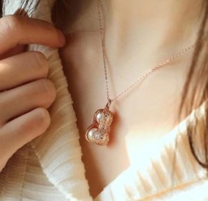KALUNG WANITA TITANIUM MOTIF KACANG MUTIARA ANTI KARAT NYAMAN DI PAKAI