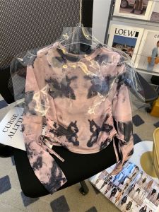 เสื้อยืดแขนยาวผ้าตาข่ายทรงเข้ารูปสำหรับผู้หญิง ฤดูร้อน 2025 ดีไซน์เก๋ไก๋ สายรัดเอว เสื้อผ้ากันแดด เสื้อผ้าทำงานสไตล์ฝรั่งเศส