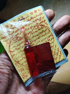 Minyak booster tulisan arab warna merah ori