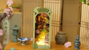 Robotime Rolife Falling Sakur Book Nook DIY Dollhouse Bookend Model Kit with LED Light Wooden Puzzle for Bookshelf Decor - TGB05