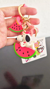 2021 Peanuts Worldwide LLC keychain (Belle on top of a watermelon)