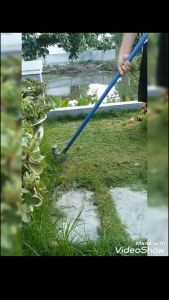 Máy cắt cỏ mô tơ điện 775 mạnh mẽ dùng để cắt tỉa sân vườn.