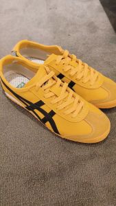 รองเท้ากีฬาสำหรับทั้งหญิงและชายแท้2025เม็กซิกัน66รองเท้าสำหรับทั้งหญิงและชายย้อนยุคคลาสสิกรองเท้าลำลองทันสมัยและรองเท้าวิ่งสบายสีเหลือง/สีดำ