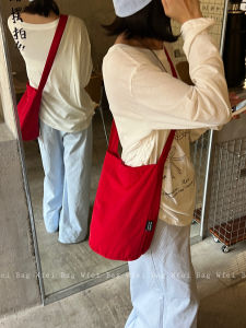 กระเป๋าสะพายข้างผ้าไนลอนสีแดง น้ำหนักเบา ดีไซน์เฉพาะตัว กระเป๋าใส่ของสำหรับเดินทางและไปทำงานได้หลากหลาย