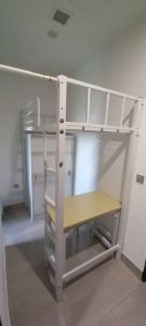 Loft bed with table and sliding door wardrobe customize for helper room singapore/store room/bomb shelter/unity