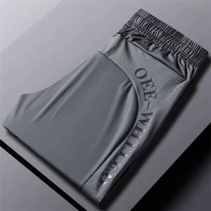 Ice Silk Mens Summer Thin Breathable Quick Dry Casual Pants Mesh Hollow out Design Loose Fit Youthful Style Long Trousers