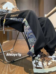 กางเกงกีฬาเอวยางยืดผ้าฝ้ายผสมปักลายสีพื้นทรงหลวมสำหรับผู้ชาย ฤดูหนาว 2024 กางเกงขายาวทรงหลวมสไตล์สตรีท