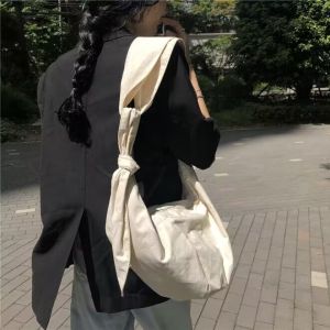 The Korean version of the new summer Instagram bloggers recommend canvas shoulder bag strap tied dumpling bag oblique straddle bag female breast bag