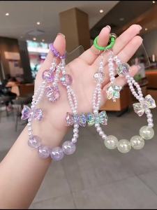 🔥COD🔥2025 New Phone Chain Strap Pearl star string chain bow hand chain exquisite bow pendant ornaments Trendy Pendant for iPhone/Samsung Universal Accessories Cute Phone Hanging Rope Love Heart Beaded Lanyard Pendant