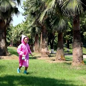 Kids Eco-Friendly Waterproof Raincoat with Snap-Button Closure and Adjustable Hood