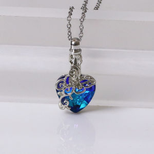 A Butterfly Tree of Life Urn Necklace Commemorating Loved Ones and Pets Used to Hold the Ashes of Loved Ones or Pets Suitable