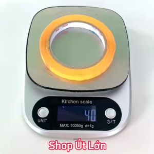 1 Cuộn băng keo màu vàng OPP rộng 1.2cm dài 75 mét lõi giấy 3mm giá tại xưởng