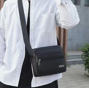 ARCTIC HUNTER กระเป๋าลำลองสำหรับบุรุษกระเป๋าสะพายไหล่ลายเส้นทแยงมุมกันน้ำสีทึบกระเป๋าป้องกันคราบสกปรก กระเป๋าผู้ชาย กระเป๋าสะพาย ผช กระเป๋าสะพายข้างผู้ชาย กระเป๋าสะพาย ผู้ชาย