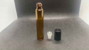 ขวด 10 มล. (50ใบ) สีชา ขวดแก้วกลม + ฝาดำ + ลูกกลิ้ง