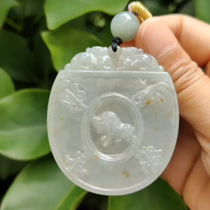 Crafted on Natural Light Green and Yellow Type-A Jadeite-Jade as Traditional Pendant with Pair of Pixiu Bull and Chinese Word meaning auspicious certificate weighs 32.14 grams measurement 54.5 * 47.5 * 5.5 mm (pendant301)