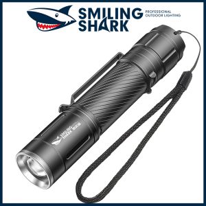 SD7115E ฉลามยิ้มไฟฉายชาร์จได้ขนาดเล็กแบบพกพากันน้ำแสงแฟลชสำหรับเดินป่าตั้งแคมป์กลางแจ้ง