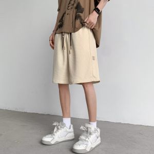 เสื้อเชิ้ตยีนส์แขนสั้นผู้ชาย ทรงหลวม สไตล์อเมริกันย้อนยุค ชุดทำงานฤดูร้อน 2025 เสื้อเชิ้ตแขนสั้นแบบลำลอง แฟชั่น