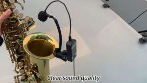 Mikrofon nirkabel pengambilan Saksofon instrumen UHF mic memiliki 3 mode suara dan memiliki jangkauan 50 meter dan dapat digunakan untuk pertunjukan panggung