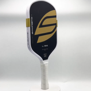 Boomsti Gold Pickleball Paddle** - T700 carbon fiber frame with EPP+EVA composite face. Lightweight & durable for competitive and recreational play. Features a non-slip grip and exclusive LABS edition multi-layer surface