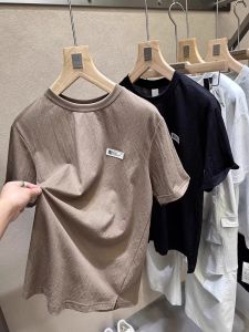 เสื้อยืดแขนสั้นผู้ชายคอตตอนระบายอากาศได้ดี ทรงหลวม สไตล์ลำลอง ฤดูร้อน 2025 เสื้อผ้าทำงานผู้ชาย