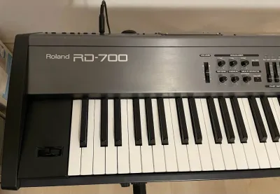 Roland RD-700 Digital Stage Piano 88 keys including stand pedal and carry bag