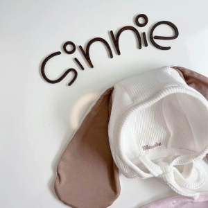 Nón buộc dây tai cún siêu dài cho bé Sinnie mũ cotton tổ ong thoáng mát style Hàn