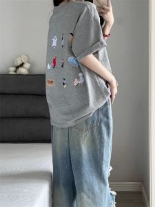 เสื้อยืดคอกลมแขนสั้นทรงหลวมสไตล์ย้อนยุคอเมริกันสำหรับผู้หญิงในช่วงฤดูร้อน เสื้อผ้าทำงานคอตตอนพิมพ์ลายการ์ตูน