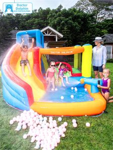 Doctor Dolphin | Indoor Outdoor Bounce House Slide Castle
