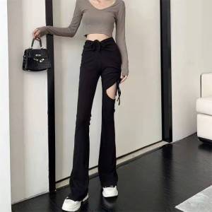 กางเกงยีนส์ทรงหลวมเอวสูงทรงหลวมทรงหลวมสไตล์ฤดูใบไม้ผลิและฤดูใบไม้ร่วงใหม่ ดีไซน์ปักลาย ทรงหลวม ทรงหลวม ทรงหลวม