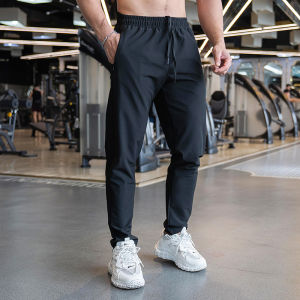 กางเกงกีฬาลำลองสีขาวสไตล์เกาหลี แฟชั่นเทรนด์ใหม่ สำหรับผู้ชาย กางเกงขายาวแบบอเนกประสงค์ สวมใส่สบาย