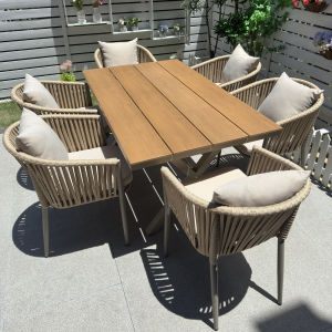 Nordic Style Outdoor Wicker Table And Chairs Waterproof Sunscreen Popular Dining Table for Courtyard Villa Garden Combination