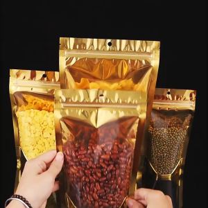 พร้อมส่ง【ถุงฟอยด์สีทอง】( 50 ใบ) ด้านหน้าใส ด้านหลังทอง ตั้งได้ ถุงใส่อาหาร ถุงฟอยด์ ถุงเมทัลไลท์ มีของพร้อมส่ง เก็บเงินปลายทาง