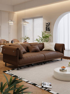 Slandi | Italian Minimalist Embracing Sofa High Legs