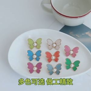 หัวเข็มขัดเอวผีเสื้อแบบเย็บฟรีและเจาะแบบเกาหลีเพื่อเปลี่ยนรอบเอวของกางเกงด้วยสิ่งประดิษฐ์เล็ก ๆ เพื่อยึดเข็มขัดเข็มกลัดแ