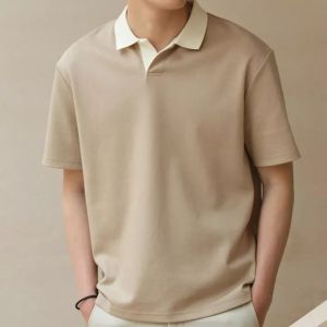 เวอร์ชั่นเกาหลีแฟชั่นลำลองเสื้อโปโลผู้ชายสีทึบหลวมสีตัดปกธุรกิจเสื้อโปโลแขนสั้น เสื้อยืดคอปกชาย เสื้อโปโลผู้ชาย เช่น 2022