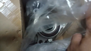 Front Wheel Bearing for Honda City 2021-2024 I JPH 5028S. Metallic cylindrical with mounting bolts packaged in plastic.