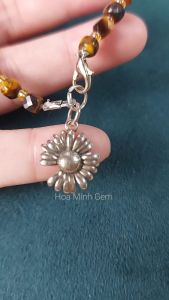 Lắc tay nữ đá Mắt Hổ vàng nâu vuông cắt giác facet size 5 li phối charm hoa hướng dương xi bạc | Hoa Minh Gem