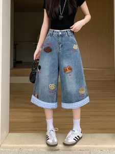 กางเกงขาสั้นผ้ายีนส์ขาดหยักสไตล์อเมริกันสำหรับผู้หญิง ฤดูร้อนปี 2025 กางเกงขายาวทรงหลวม ทรงเข้ารูป กางเกงขายาวทรงเจ็ดส่วน