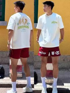 เสื้อยืดแขนสั้นผ้าฝ้ายแท้สีขาว ทรงหลวม สำหรับผู้ชาย ฤดูร้อน 2025 ใหม่ เสื้อยืดแขนสั้น INS ทรงหลวม ดีไซน์เก๋ไก๋ สำหรับผู้ชาย