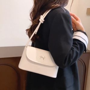 miumiubagshop(M2171) กระเป๋าสะพายไหล่หนังพียู ด้านหน้ามีโบว์ ทรงน่ารัก