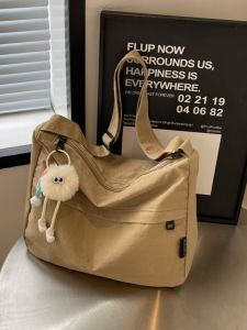 กระเป๋าสะพายข้างผ้าแคนวาสความจุขนาดใหญ่สำหรับผู้หญิง กระเป๋าสะพายไหล่เดียวสำหรับเดินทางและเรียนหนังสือ กระเป๋าถือทรง Tote แบบลำลองสำหรับฤดูร้อนปี 2024