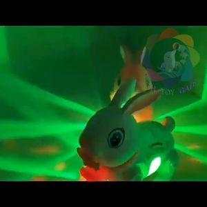 Đồ chơi thỏ dẫn dắt phát nhạc ánh sáng nhảy vui nhộn đáng yêu cho bé Đồ chơi thỏ đi bộ điện tử có Dây kéo