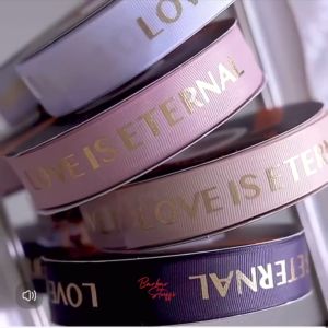 ริบบิ้นผ้าซาติน ปั๊มตัวหนังสือสีทองหรู เนื้อดี สีสวย (แบ่งตัด 1 หลา = 90cm.)