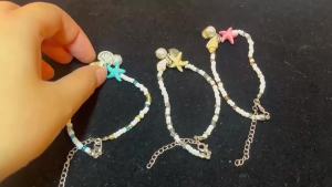 手工编织热销 波西米亚风海星贝壳海螺米珠手链 夏季沙滩度假手链Hand woven hot selling Bohemian style starfish shell conch rice bead bracelet for summer beach vacation