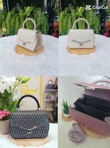 กระเป๋าผ้าไทย คละสี คละลาย กระเป๋าถือ ผ้าไทย กระเป๋าสวย เรียบหรู บริเวณที่พักผ่อน หรือห้าย