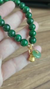 หินหยกจักรพรรดิ์ หินแท้ ขนาด 8 มิล ร้อยกับจี้ถุงทองหยกพม่า หินมงคลทำพิธีแล้วทุกเส้น จัดส่งจากประเทศไทย รับประกันสินค้าจากร้านไหมทองหินมงคล