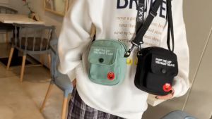 [BISA COD] TASNOVAKU - Tas Selempang Wanita Slingbag Mini Kanvas Elmo - Fashion Korea