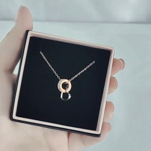 SO SEOUL Aurelia Barrel Love Interlocking Diamond Simulant Cubic Zirconia Rose Gold Pendant Necklace