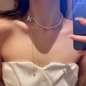 แฟชั่นใหม่โซ่ไหปลาร้าไข่มุกผีเสื้อการออกแบบที่ทันสมัยสร้อยคอบอกนิสัยสร้อยคอสไตล์คนดังเครื่องประดับสร้อยโชคเกอร์ผู้หญิง